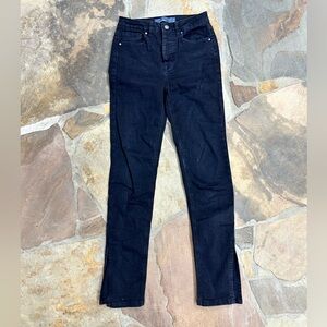 Indigo rising Sleek black high-waisted jeans with a slit at the hem size 26